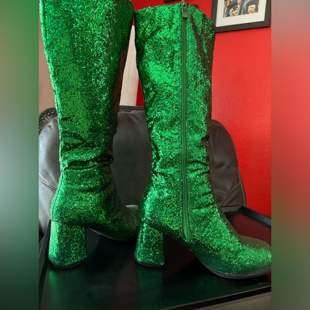Green glitter thigh, high boots.
